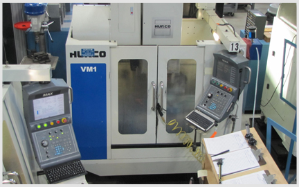 Here is a photo of our 3 Axis Hurco Milling Machine